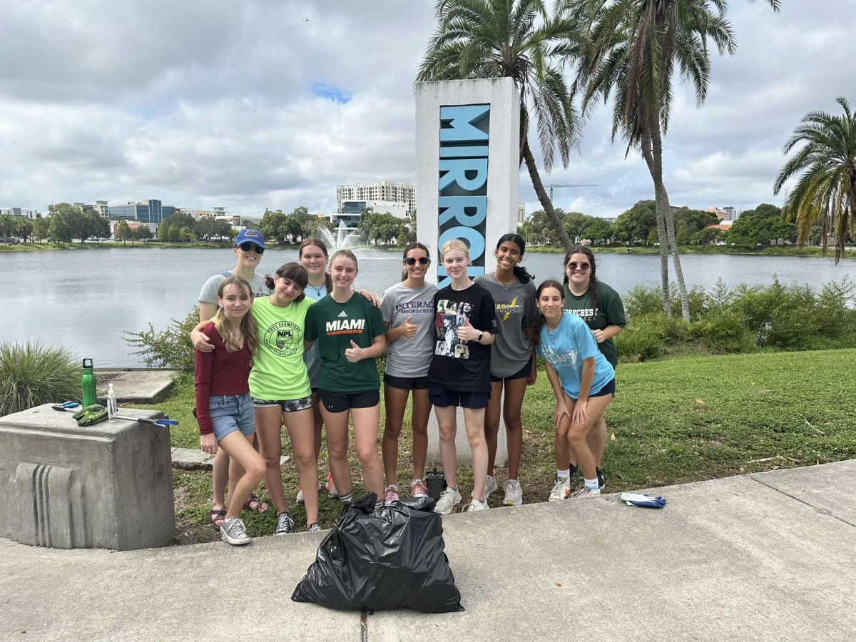 Left to right: sophomore Phoebe Pritchard, US Math Department Chair Jessica Thorn, sophomore Odeyah Rozin, senior Kara Marcin, sophomore Scout Brummett, senior Addie Oman, senior, Lily Dunn, sophmore Simi Damani, senior Noëlle de Wilde, and senior Libby Cenedella participate in a clean up of Mirror Lake in St. Pete, organized by the Interact Club. US Science Teacher Summer Slater.