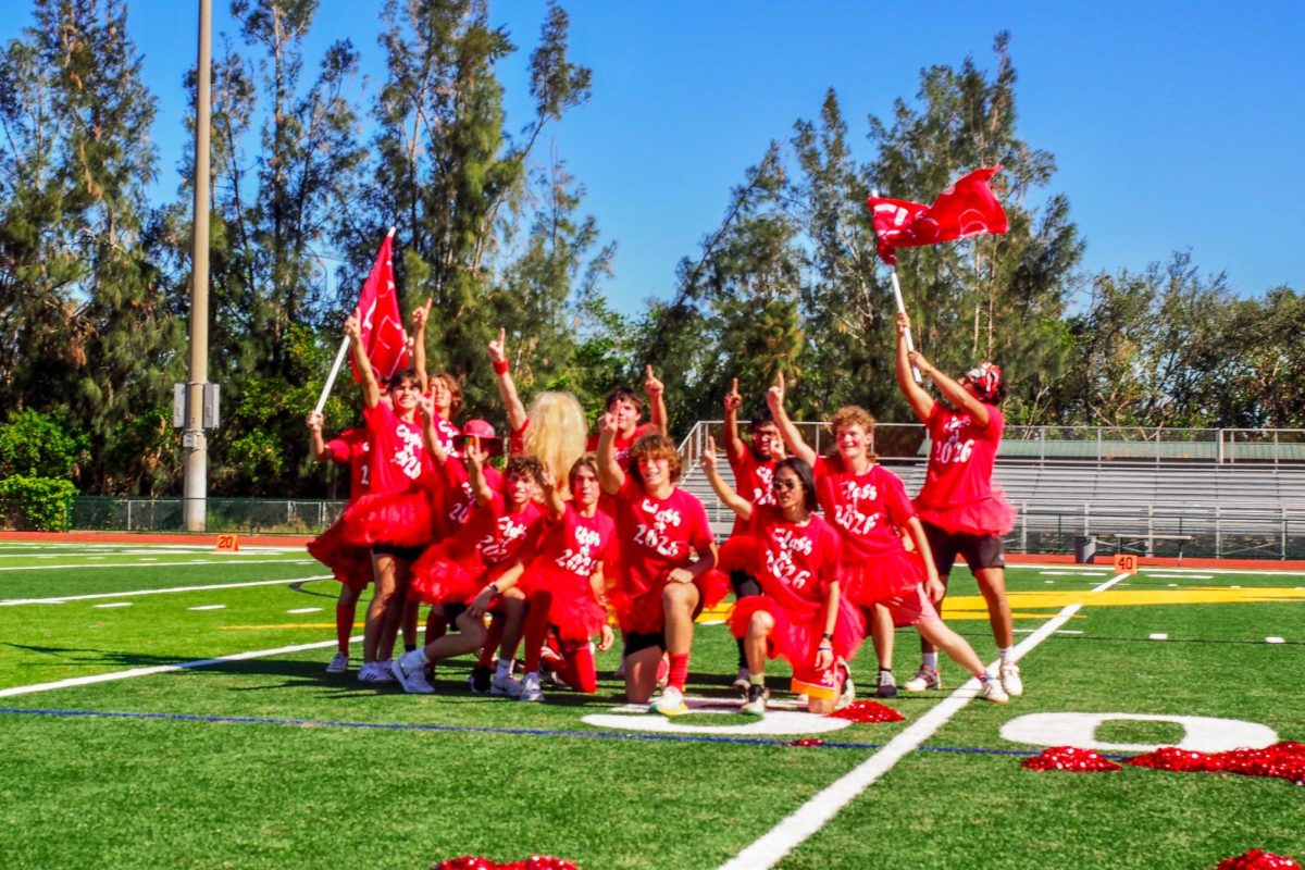 Junior boys pose at the end of their powder puff cheer. The juniors looked to defend their 2023 cheer title, but fell short to the seniors.