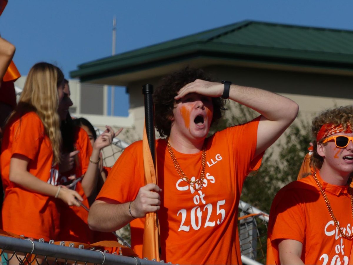 Senior Tommy Murphy displays his disbelief with a call made by the referee during powder puff football.