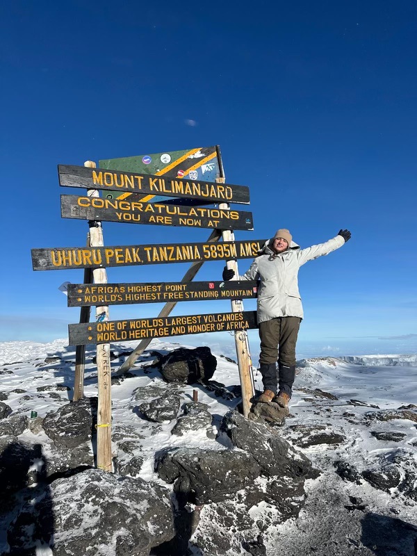 Annabella Rozin ‘24 poses at Uhuru Peak, the highest point on Mount Kilimanjaro. 