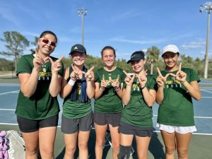 Shorecrest varsity girls tennis players (Left to right: Lucille Procaccino, Isabella Jank, Charlotte Hansen, Katie Ross, and Mana Bilgutay) pose for a winning picture after their regional finals game on April 24th, 2025. They won the final four matches to one. Photo courtesy of Lucille Procaccino.
