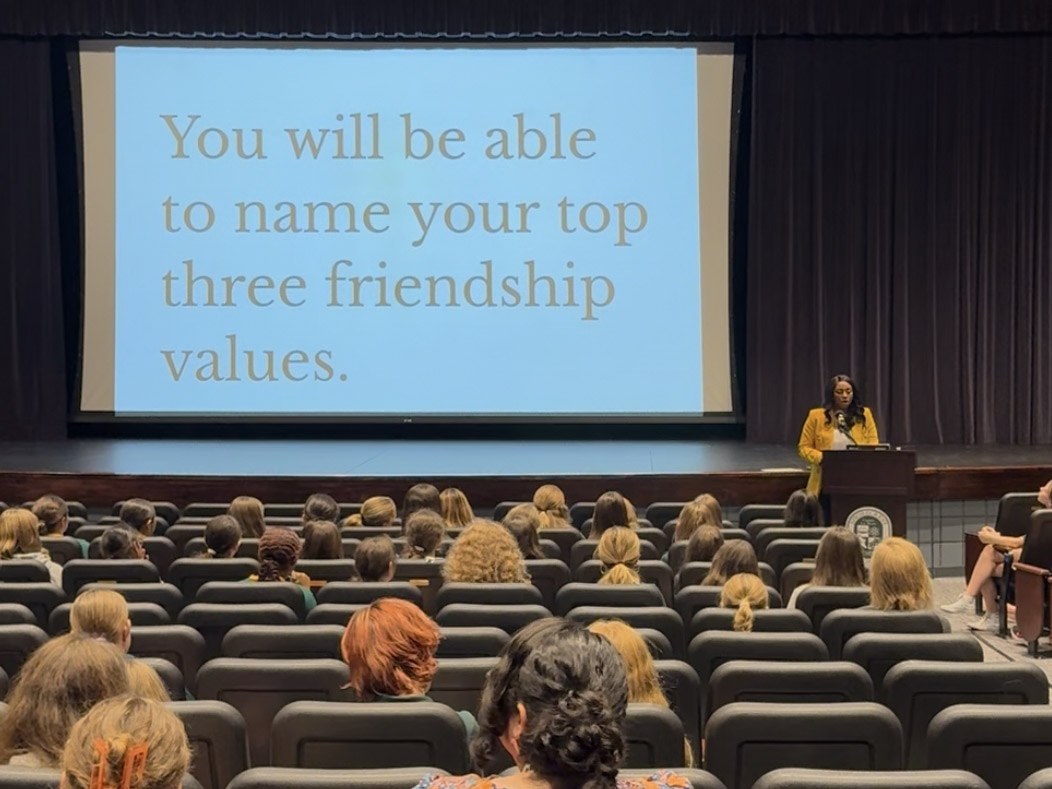 Middle School girls listen to guest speaker Danielle Bayard Jackson when she was on campus on September 11. Jackson helped resolve conflicts within MS friend groups. Photo by Rachael Barrett.
