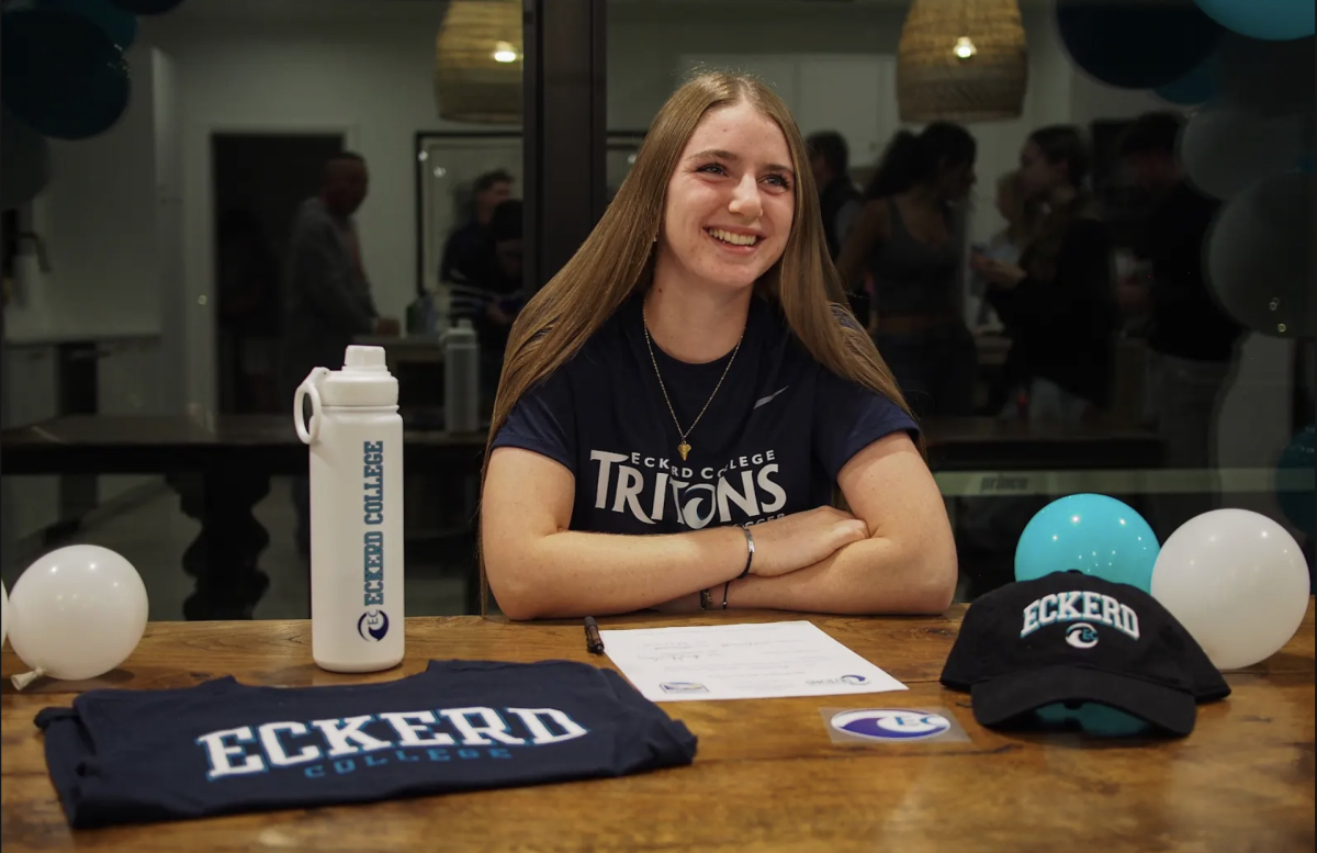 Senior Scout Brummett smiles during her signing ceremony. She is committed to Eckerd college to play soccer next year. 