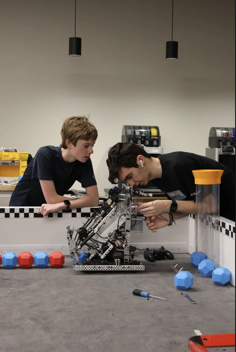 Sophomore Logan Sickling and senior Gaston Grehan-Savona work on their robot. The Shorecrest robotics teams have recently placed well in tournaments. 