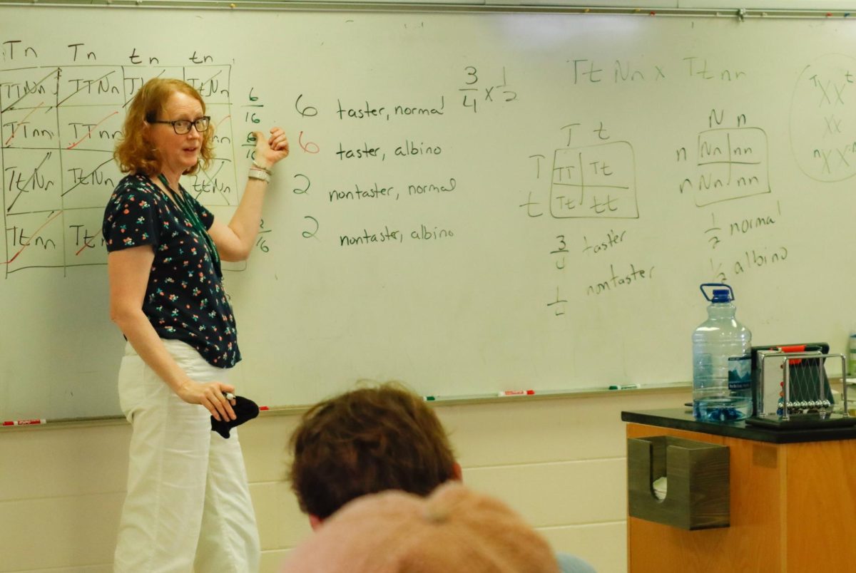 Upper School Science Teacher Bernadette Kozlowski teaching punnett squares to her College Prep biology Class. Along with biology, Kozlowski also teaches College Prep physics.