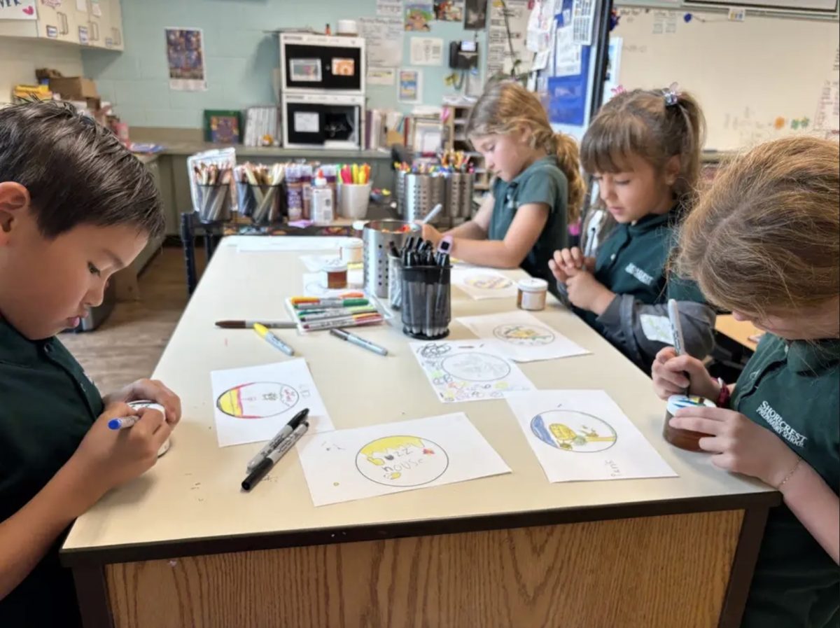 Students in Second Grade Teacher Christine Oman’s class work on their honey bee projects. Once the project is over, each student will take home their hand-decorated honey jar. Courtesy of Christine Oman.